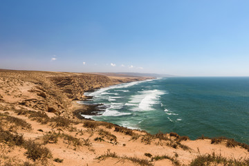 Wall Mural - Rough colorful coastline, Atlantic, Morocco