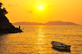 Fototapeta Zachód słońca - Beach on Tropical Islands at Sunset