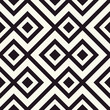 Tile floor in geometrical seamless pattern in beige and black tones