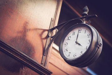 vintage clock on a wooden wall