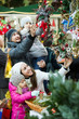 © JackF - Happy family choosing christmas decorations