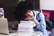© 4frame group - Young african american woman student tired of working and studying