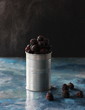 Fresh blackberry in metal jar
