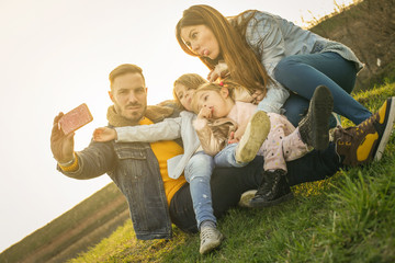 Happy family in the park.