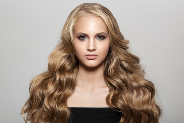  Portrait Of A Beautiful Young Blond Woman With Long Wavy Hair