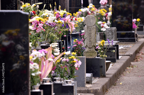 Offering Of Flowers Has Been Placed At The Grave Buddhist Holiday Celebrated By Japanese Sects It Is Called Higan In Japan Stock Photo Adobe Stock