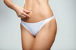 © puhhha - Hot Slim Woman Body In White Panties Pinching Abdomen. Fitness
