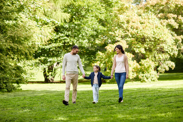 Wall Mural - happy family walking in summer park