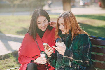 Two girls with gadget