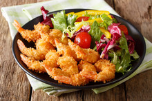 Fried Shrimps Tempura And Fresh Salad Close-up On A Plate. Horizontal