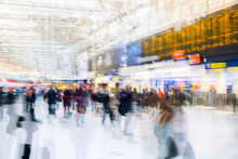 Multiple Exposure Image Of Lots Of People Walking And Waiting For Boarding In The Waterloo Train Station. Commuting Rush Hours Concept, Modern Life. 