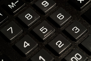 Calculator buttons closeup on white background isolated