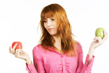 redhair girl with apple over white background