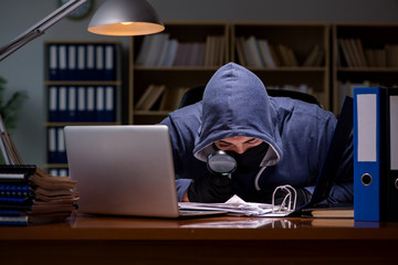 hacker stealing personal data from home computer