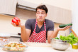 © Elnur - Man male cook preparing food in kitchen