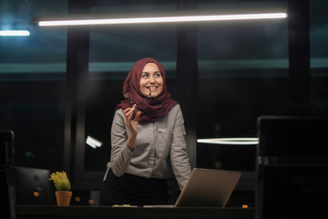 Portrait of young business woman in office