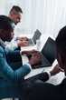 © golubovy - IT manager learning specialists in the company office. Qualification training for employees to improve skills.