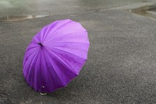 Umbrella Purple On Road And Rain Drop With Copy Space For Add Text