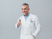Cheerful Doctor Giving A Thumbs Up