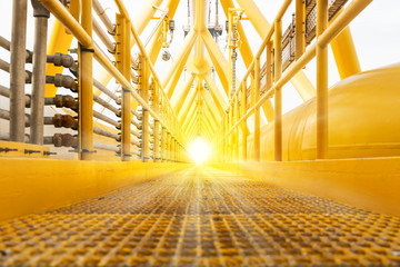 Wall Mural - Oil and gas central processing platform and flare bridge on sunset or sunrise time