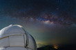 observatory with milky way galaxy, long exposure photograph, with grain.Image contain certain grain or noise and soft focus. color tone effect, astronomy concept.