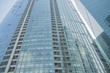 © de Art - Skyscrapers with glass facade. Modern buildings in business district. Concepts of economics, financial, future
