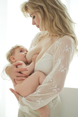 A woman is breast-feeding 