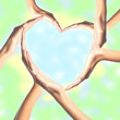 © wolfelarry - Human hands in heart shape over bright background