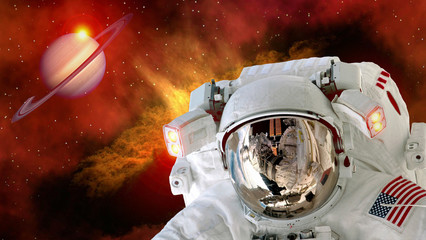 Wall Mural - astronaut planet saturn spaceman helmet stars space suit galaxy universe. elements of this image fur