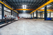 © kerkezz - Industrial hall with machines and metal profiles
