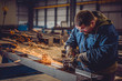© kerkezz - Worker Using Angle Grinder