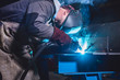 © kerkezz - Industrial Welder With Torch