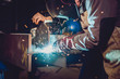 © kerkezz - Industrial Welder With Torch