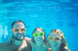Underwater portrait of family