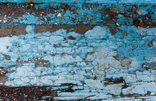Wood Floor With Blue Cracked Paint. Grunge Background.