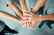 © xy - People with their hands together. team work concept