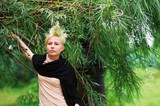 Fototapeta Dziecięca - Portrait of young cute, confident girls blonde about willow in the summer Park
