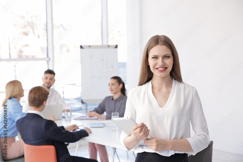 Young woman at business presentation