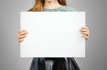 Woman Showing Blank White Big A2 Paper. Leaflet Presentation. Pamphlet Hold Hands. Girl Show Clear Offset Paper. Sheet Template. Booklet Design Sheet Display Read First Person.