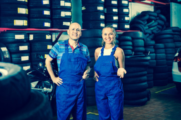 Wall Mural - Portrait of two  workers in protective overalls