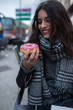 © ADDICTIVE STOCK - Woman with coffee and donut