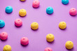 photo of tasty colorful marshmallows on the wonderful purple background