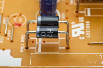 Resistors, capacitors and other electronic components of micro chip inside the computer close up