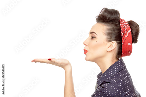 Stunning pinup girl blowing kisses Wallpaper Mural