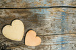 valentines day or wedding banner with tho hearts and copy space. love concept on shabby chic wooden background