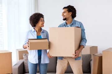 Poster - happy couple with boxes moving to new home