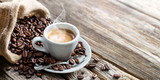 Fototapeta Panele - Espresso Coffee Cup With Beans On Vintage Table
