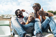 © santypan - Two black race friends having fun.