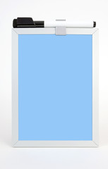 Wall Mural - Blue dry erase board with pen atop board. Vertical.