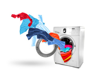 Wall Mural - Clothes in washing machine on white background